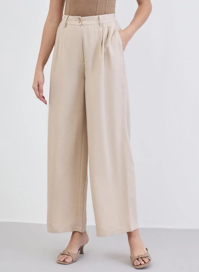 Styli Women Beige Wide Leg Trousers